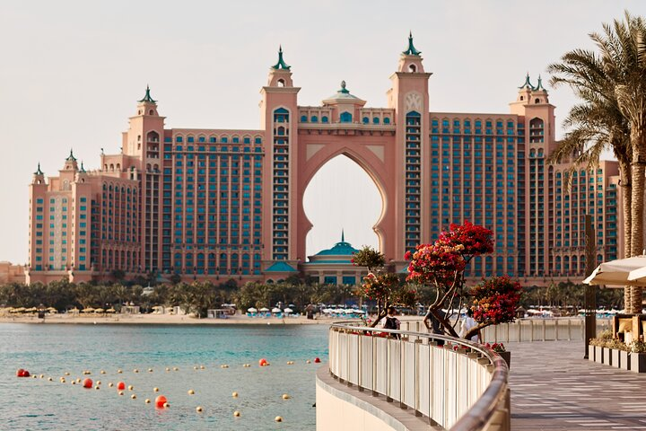 Discover breathtaking views of the iconic Palm Island while exploring Dubai. Marvel at architectural masterpieces and immerse yourself in the rich culture and history during this unforgettable city tour.